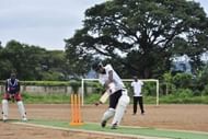 People play cricket at Kingtom Oval in Freetown, Sierra Leone's only cricket ground, on November 15, 2012